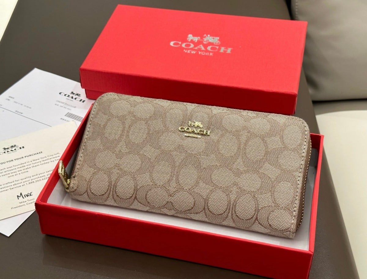 Coach Long Zip Around Wallet In Signature Canvas (Light Khaki / Sand)
